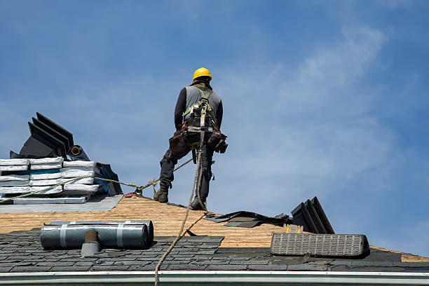 Professional Roofing technician working in Slovan, PA